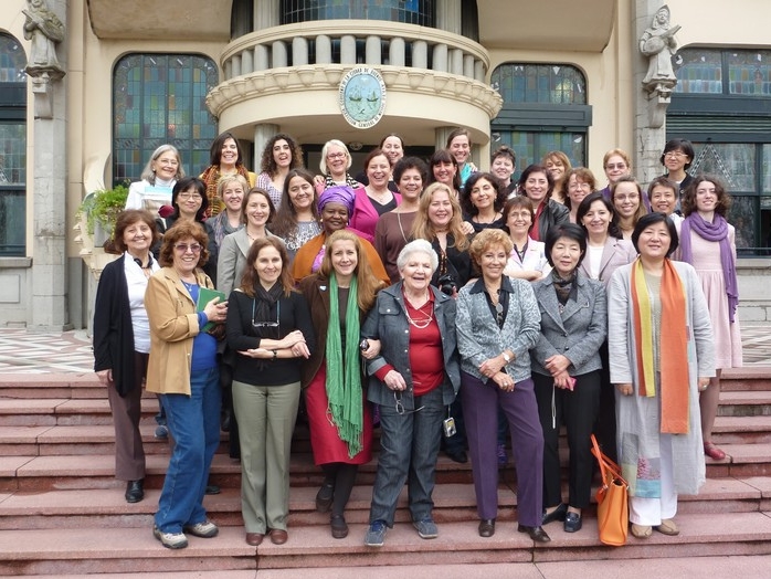 Group gathers in front of museum in 2019