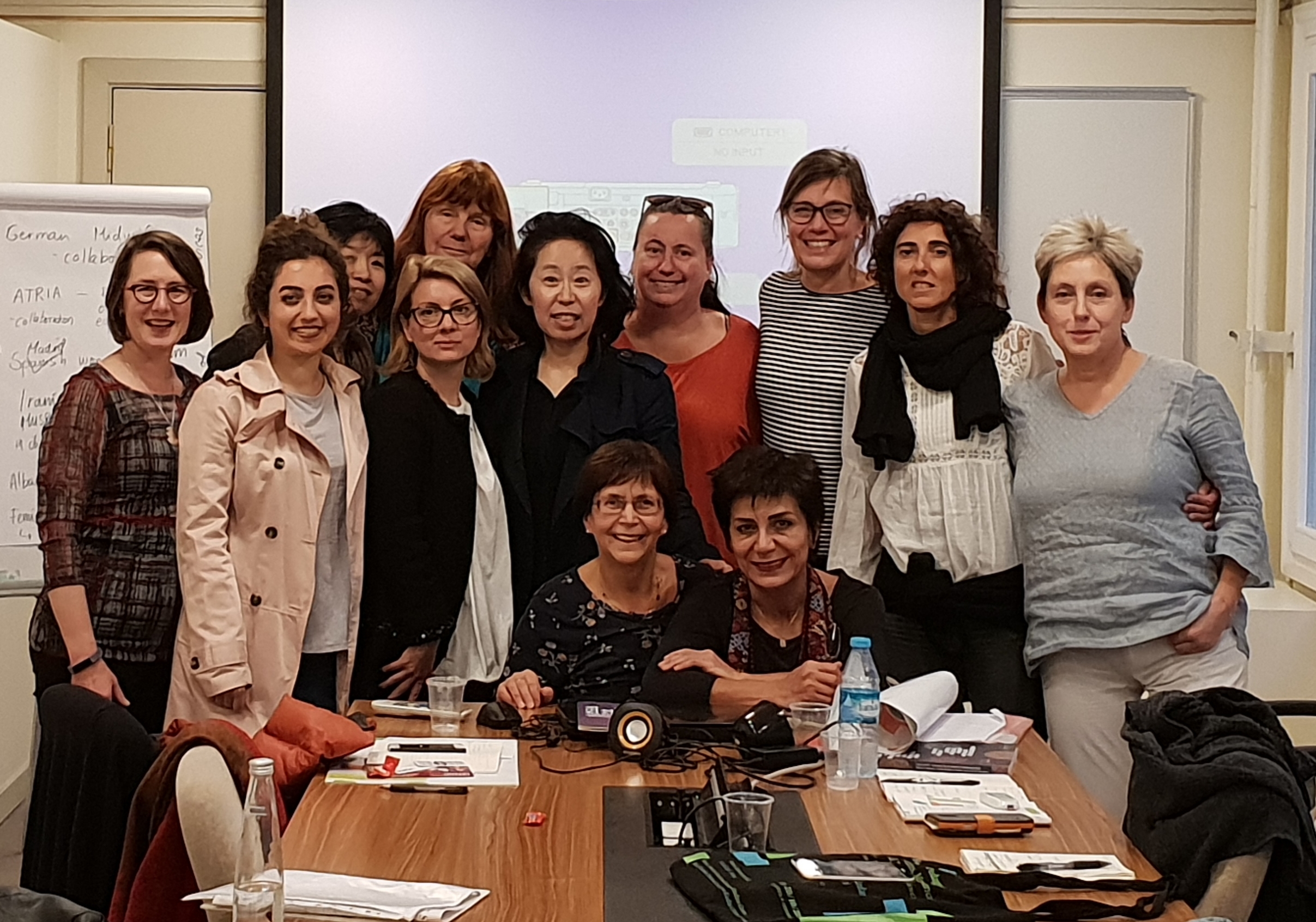 Group of women gather during a workshop